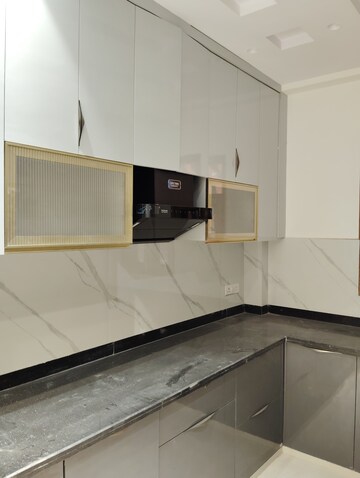 Kitchen in 4 BHK Builder Floor at Green Homes, Niti Khand – for Rent