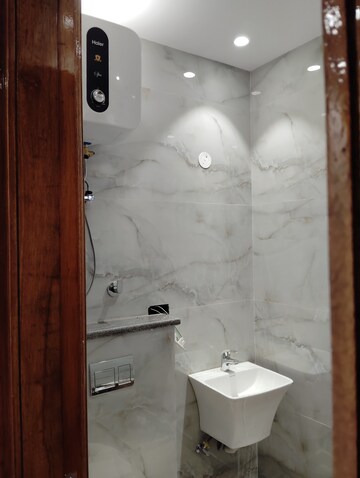 Bathroom in 4 BHK Builder Floor at Green Homes, Niti Khand – for Rent