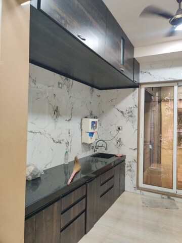 Kitchen in 4 BHK Apartment at Rashmi Signature, Mira Road – for Rent