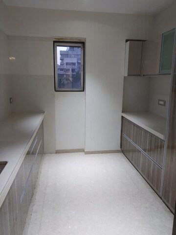 Kitchen in 3 BHK Apartment at Raunak Viraj Silverene, Bandra West – for Rent