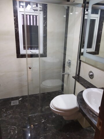 Bathroom in 3 BHK Apartment at Raunak Viraj Silverene, Bandra West – for Rent