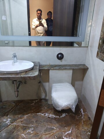 Bathroom in 3 BHK Apartment at Raunak Viraj Silverene, Bandra West – for Rent