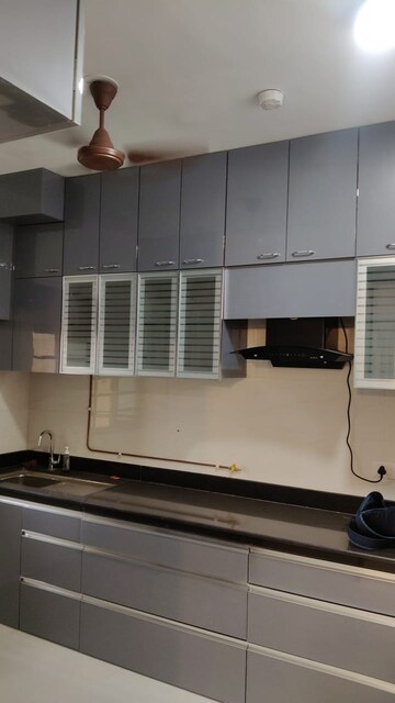 Kitchen in 3 BHK Apartment at Sheth Vasant Oasis, Andheri East – for Rent
