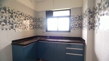 Kitchen in 1 BHK Apartment at Raunak Bliss B2, Ghodbunder Road – for Rent