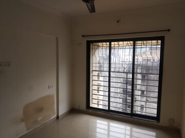 Room in 1 BHK Apartment at Shri Siddhivinayak CHS Haware, Haware City – for Rent