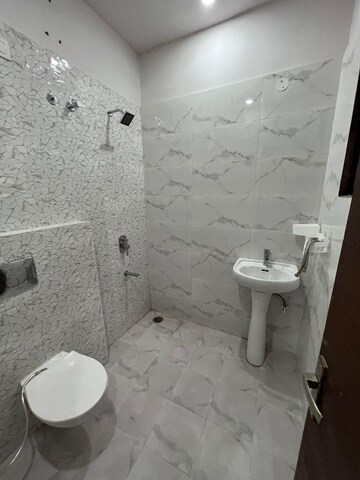 Bathroom in 3 BHK Apartment at MP Metro Towers, Dhakoli Village – for Rent