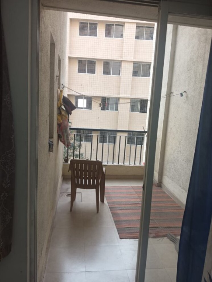 Balcony, jalan-neo-city 2 Bedroom 864 Sq.Ft. Apartment In Wagholi Pune 7819359