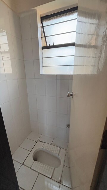 Bathroom in 2 BHK Apartment at Mahadkar Residency, Paud Road – for Rent