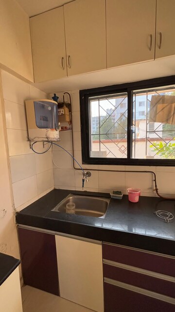 Kitchen in 2 BHK Apartment at Mahadkar Residency, Paud Road – for Rent