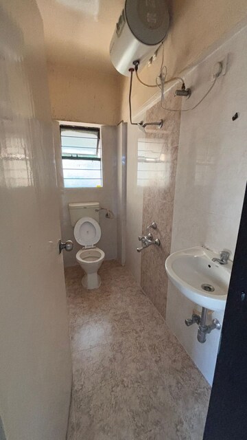 Bathroom in 2 BHK Apartment at Mahadkar Residency, Paud Road – for Rent