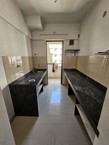 Kitchen in 1.5 BHK Apartment at Lodha Palava City Lakeshore Greens, Dombivli East – for Rent