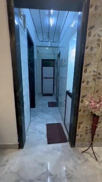 Building Lobby in 1 BHK Apartment at Kundan Palace, Ulhasnagar – for Sale