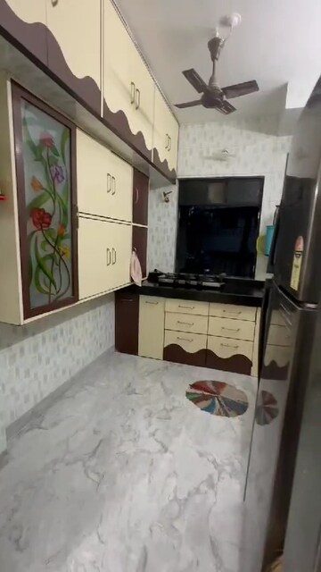 Kitchen in 1 BHK Apartment at Kundan Palace, Ulhasnagar – for Sale