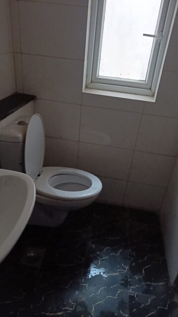Bathroom in 2 BHK Apartment at Adore Happy Homes Pride, Sector 75 – for Sale