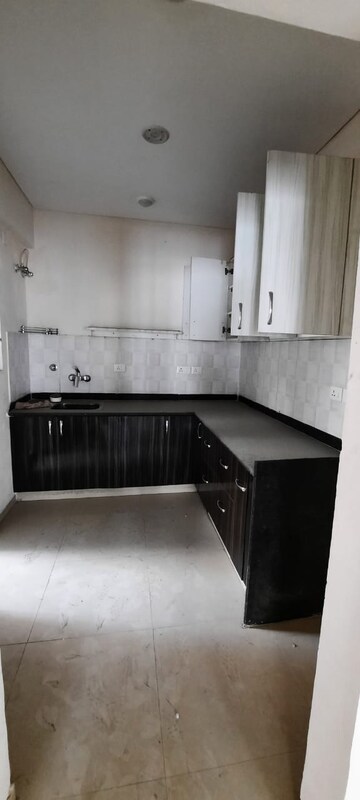 Kitchen in 2 BHK Apartment at Adore Happy Homes Pride, Sector 75 – for Sale
