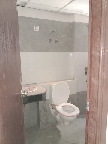 Bathroom in 2.5 BHK Apartment at Cosmos Express 99, Sector 99 – for Sale