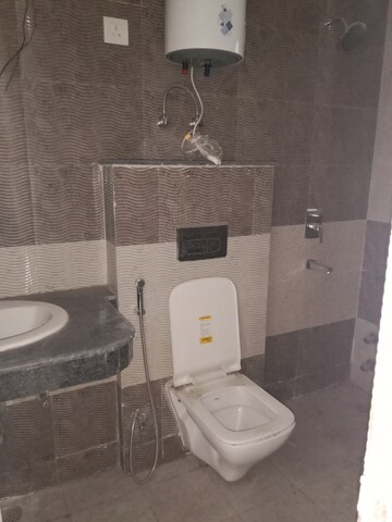 Bathroom in 3 BHK Apartment at Cosmos Express 99, Sector 99 – for Sale