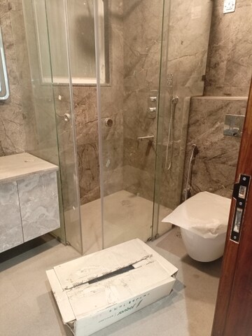 Bathroom in 3 BHK Apartment at Rajouri Garden – for Rent