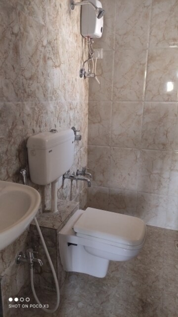 Bathroom in 1 BHK Apartment at Raunak Heights, Ghodbunder Road – for Rent