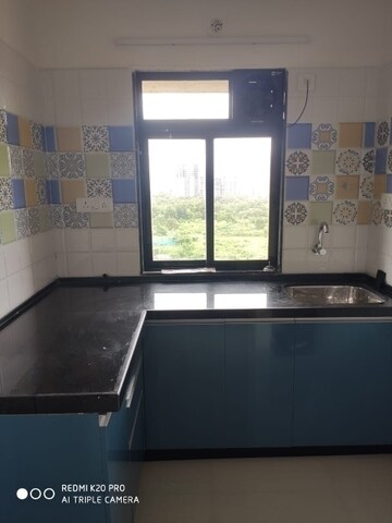 Kitchen in 1 BHK Apartment at Raunak Heights, Ghodbunder Road – for Rent
