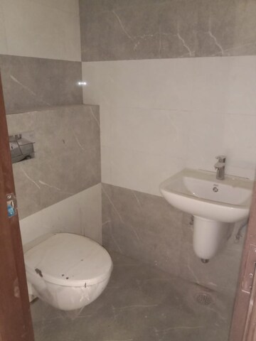 Bathroom in 3 BHK Apartment at Cosmos Express 99, Sector 99 – for Sale