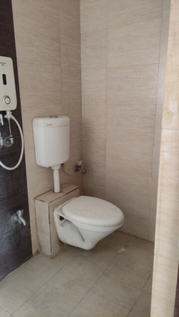Bathroom in 1 BHK Apartment at Rutu Enclave, Kasarvadavali – for Rent