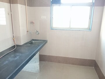 Kitchen in 1 BHK Apartment at Bindra Complex, Andheri East – for Sale