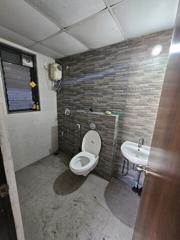 Bathroom in 1.5 BHK Apartment at Lodha Lakeshore Greens, Dombivli East – for Rent