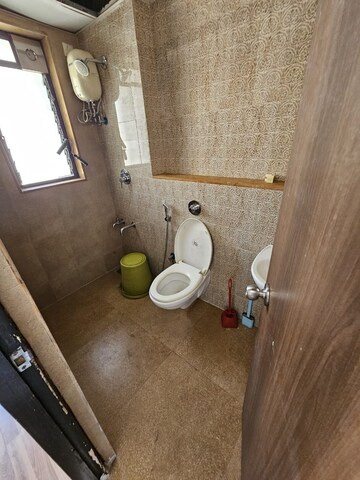 Bathroom in 1.5 BHK Apartment at Lodha Lakeshore Greens, Dombivli East – for Rent