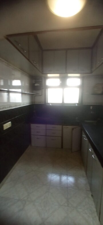 Kitchen in 1 BHK Apartment at Brahmand CHS, Brahmand – for Sale