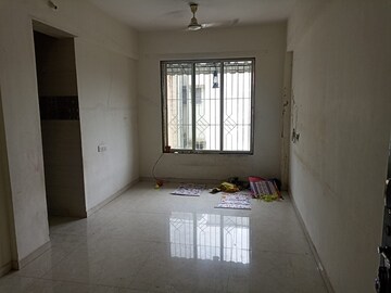 Living Room in 1.5 BHK Apartment at Wakadi – for Sale