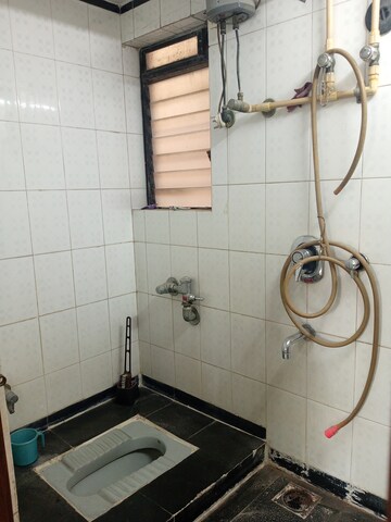 Bathroom in 1 BHK Apartment at Everest Gardens CHS, Ghatkopar East – for Rent