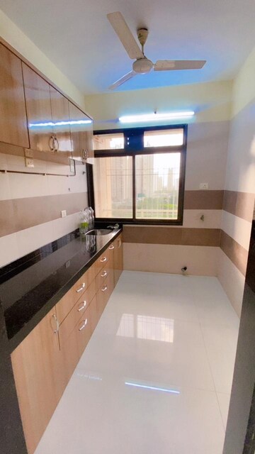 Kitchen in 2 BHK Apartment at Gami Reagan, Ghansoli – for Sale