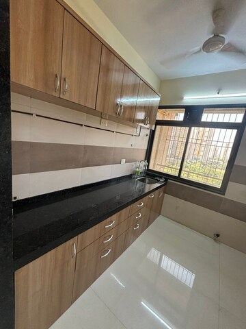 Kitchen in 2 BHK Apartment at Gami Reagan, Ghansoli – for Sale