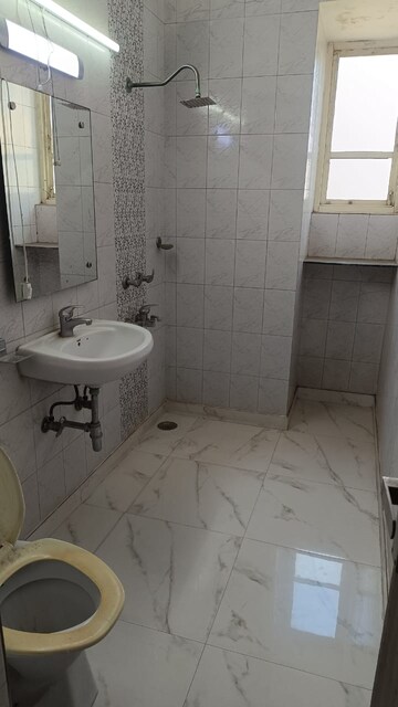 Bathroom in 3 BHK Builder Floor at Paschim Vihar – for Rent
