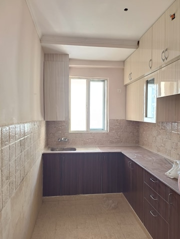 Kitchen in 3 BHK Apartment at Amrapali Golf Homes, Sector 4, Greater Noida – for Rent