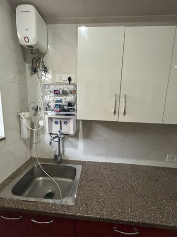 Kitchen in 2 BHK Builder Floor at Ansal Sushant Lok I, Sector 43 – for Rent