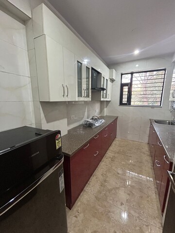 Kitchen in 2 BHK Builder Floor at Ansal Sushant Lok I, Sector 43 – for Rent