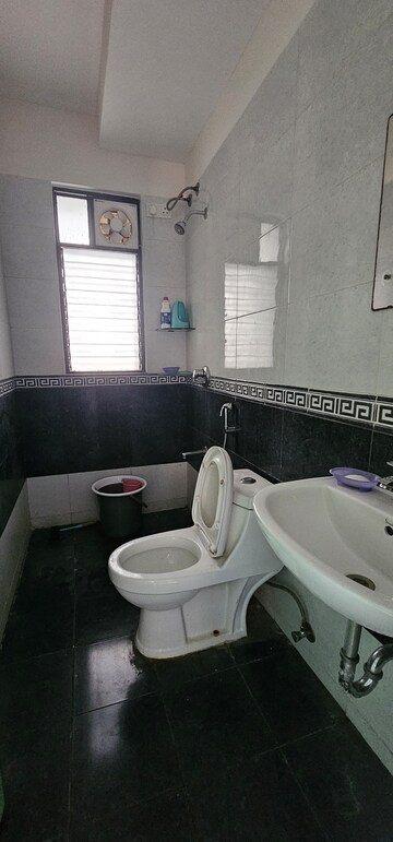 Bathroom in 2 BHK Apartment at Sarang Nanded City, Sinhagad – for Rent