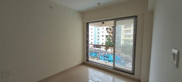 Room in 2 BHK Apartment at Tharwani Vedant Imperial Apartment, Badlapur West – for Sale