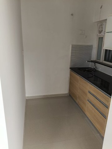 Kitchen in 2 BHK Apartment at Omkar Signet, Malad East – for Rent