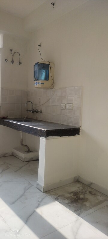 Kitchen in 2 BHK Apartment at Geotech Pristine Avenue, Sector 16c Greater Noida – for Rent