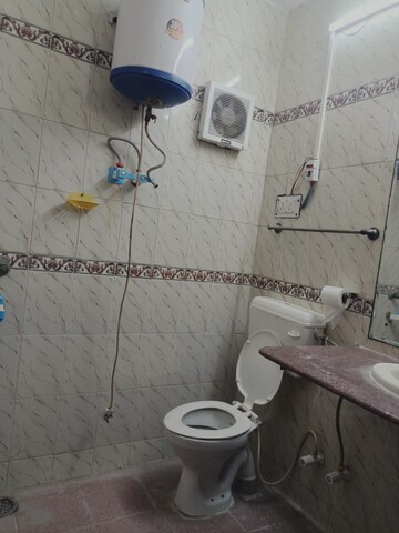 Bathroom in 2 BHK Apartment at Arun Vihar Sector 37, Sector 37 – for Rent
