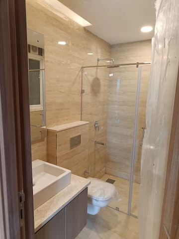 Bathroom in 2 BHK Apartment at Ambience Creacions, Sector 22 – for Rent