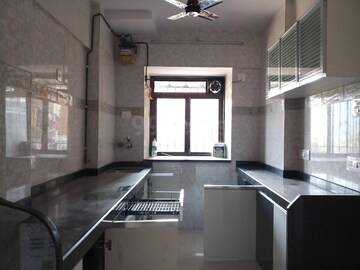 Kitchen in 2 BHK Apartment at Royal Classic Co Op Society, Andheri West – for Rent
