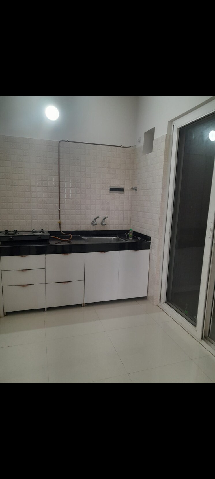 Kitchen, nyati-evolve-1 2 Bedroom 675 Sq.Ft. Apartment In Magarpatta City Pune 7971656