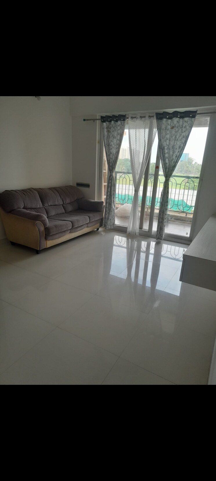 Living Room, nyati-evolve-1 2 Bedroom 675 Sq.Ft. Apartment In Magarpatta City Pune 7971656