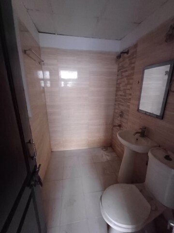 Bathroom in 3 BHK Apartment at Amrapali Zodiac, Sector 120 – for Sale