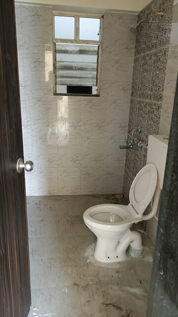 Bathroom in 2 BHK Apartment at Vedant Kingston Aura, Hadapsar – for Rent