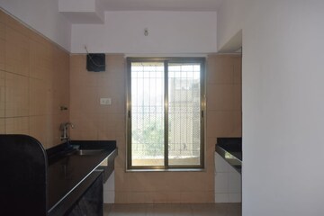 Kitchen in 2 BHK Apartment at Thane West – for Sale